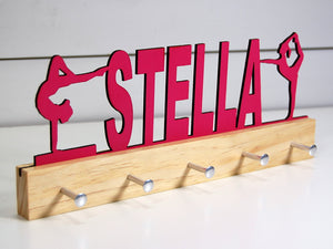 Pink "Stella" customized medal holder on a clear base