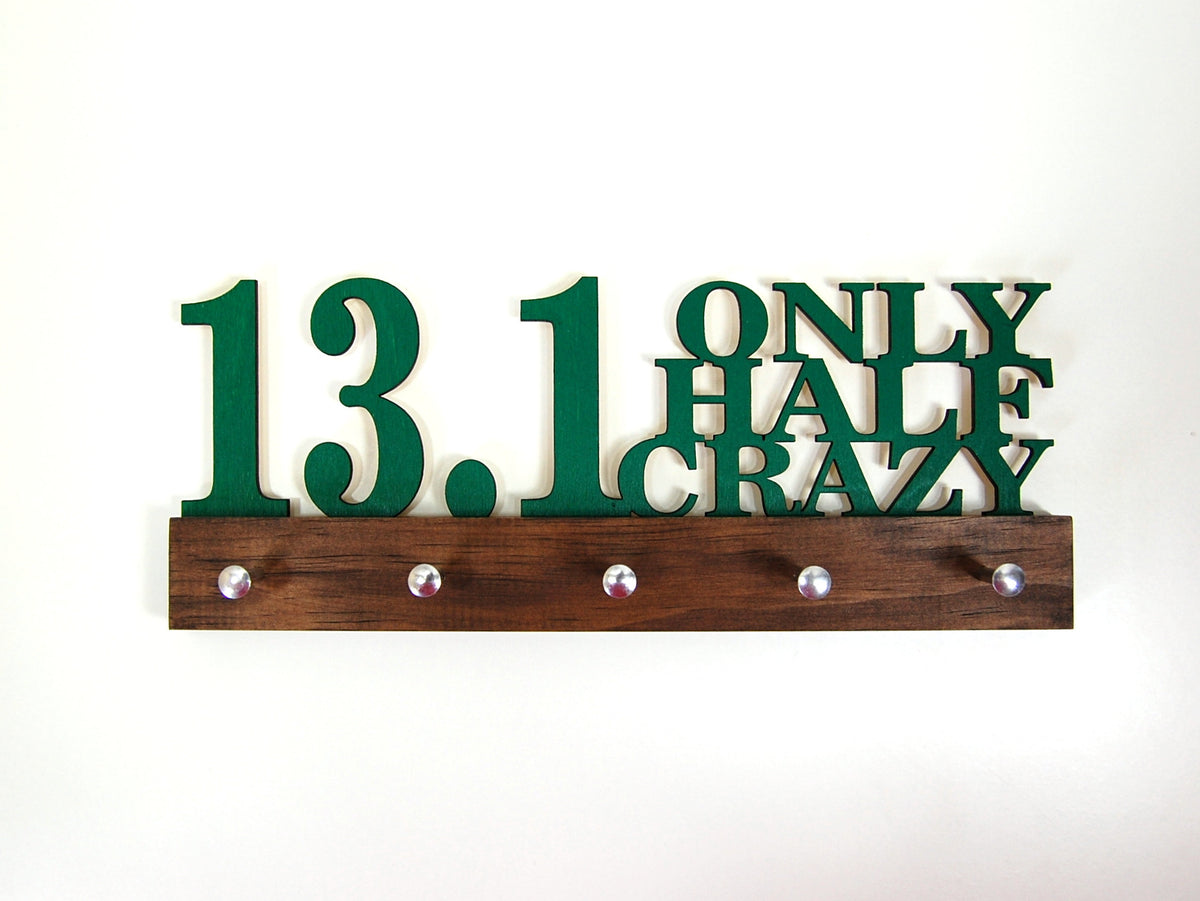 Our half marathon running medal holder is a great gift for any runner so they can display all of their awesome awards. This design comes in a variety of colors, or you can pick from our other choices of sports or phrases. Better yet, tell us your own personal mantra so we can customize a unique medal holder just for you!