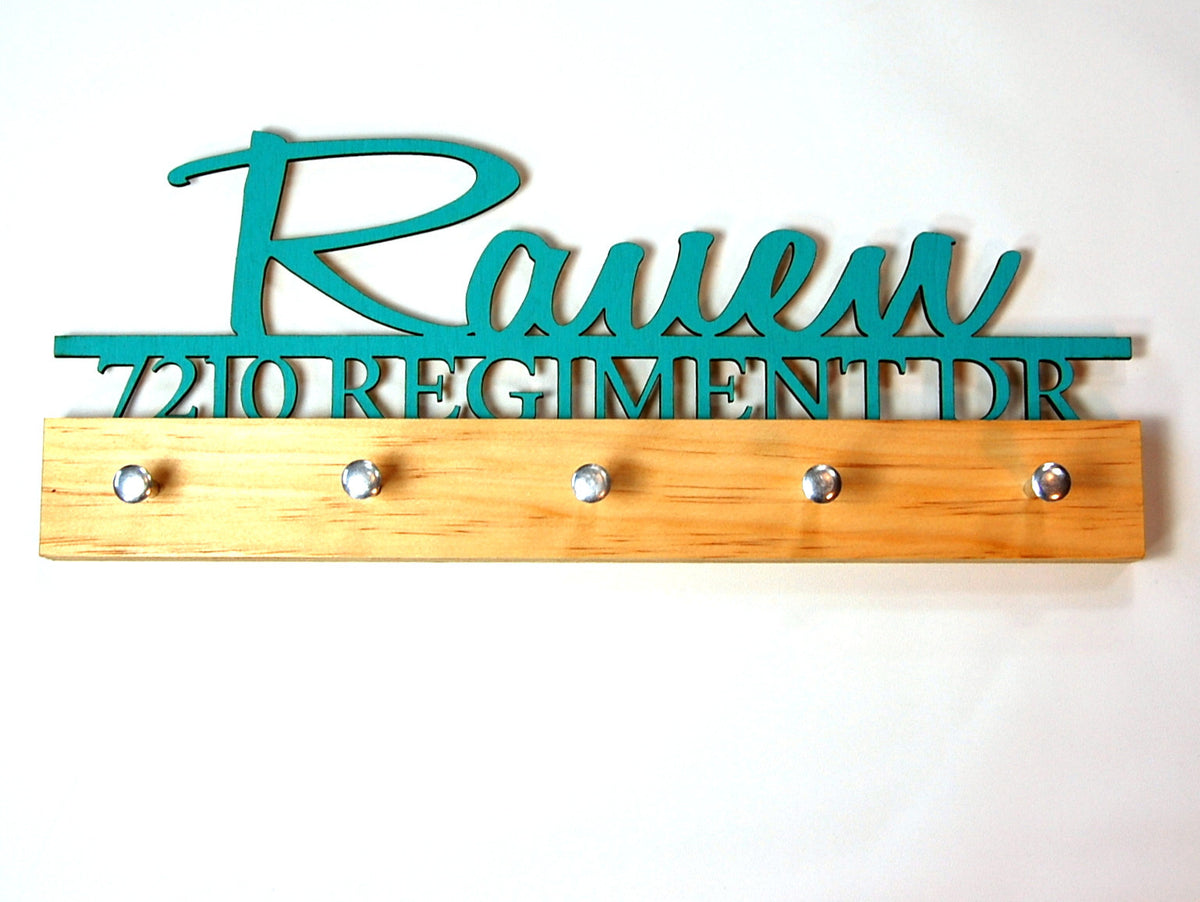 &quot;Rauen&quot; key hook display in turquoise text on a clear base