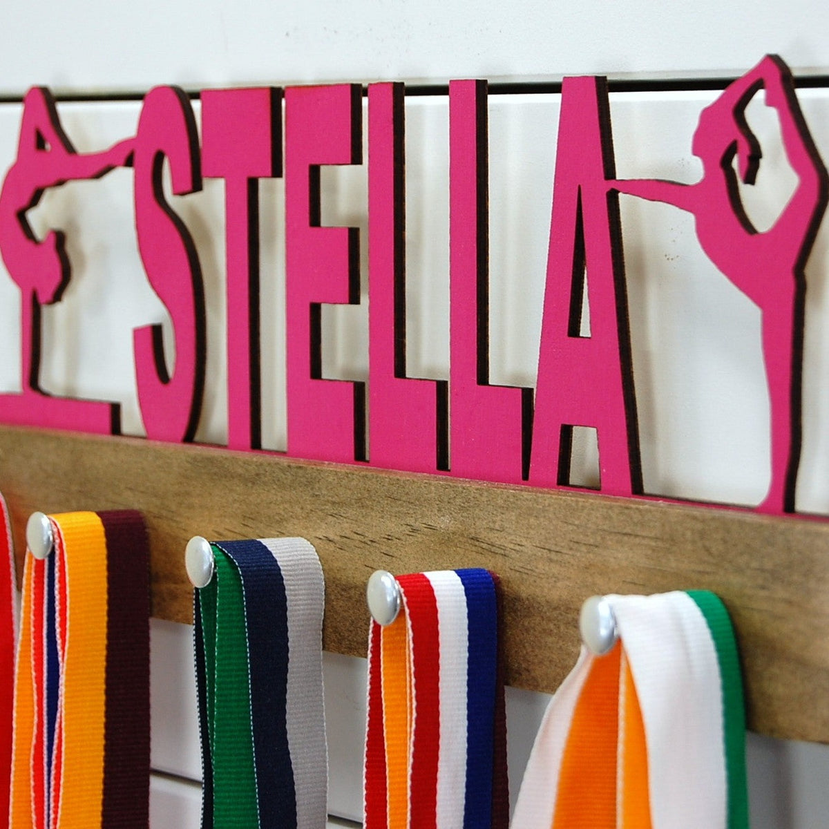 Pink gymnastics themed medal holder